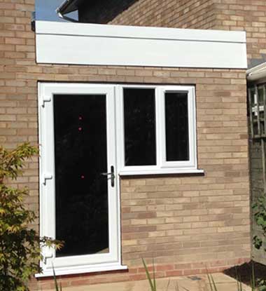 Completed house extension with window and door